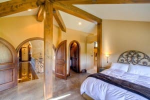 Master Bedroom with exposed finished beams