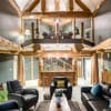 great-room-with-vaulted-ceilings-with-exposed-log-beams