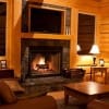 log cabin living room with fireplace