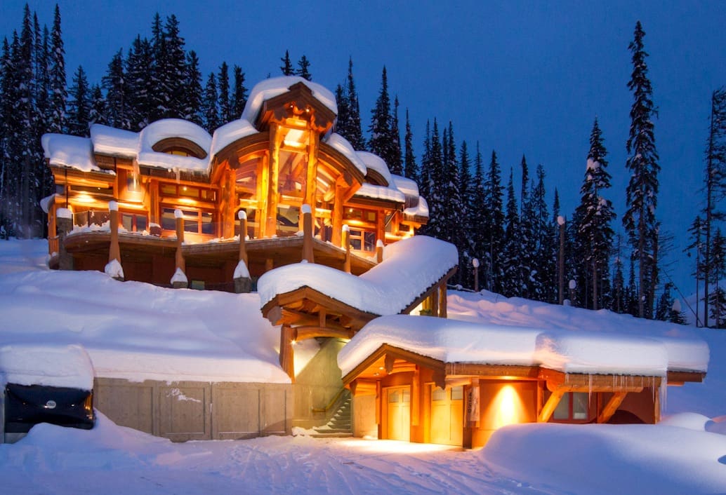 Post and Beam Log Home Design in winter.