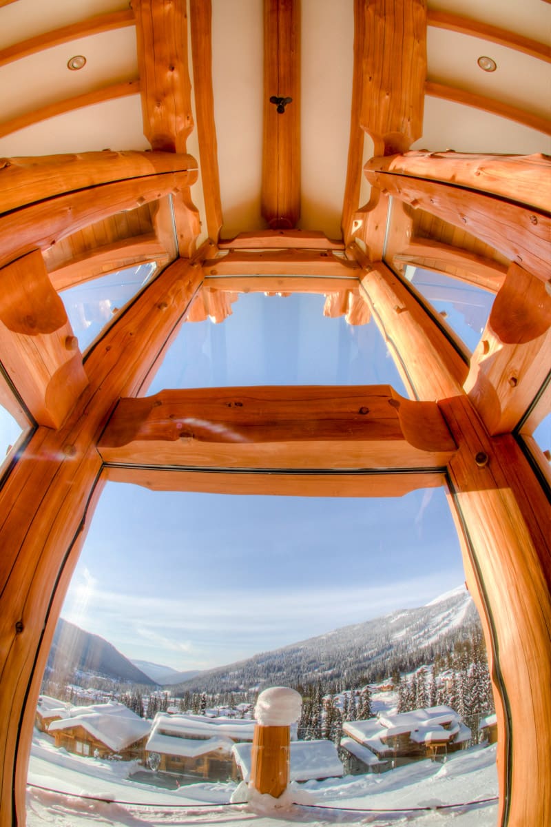 fish eye view from inside a log cabin