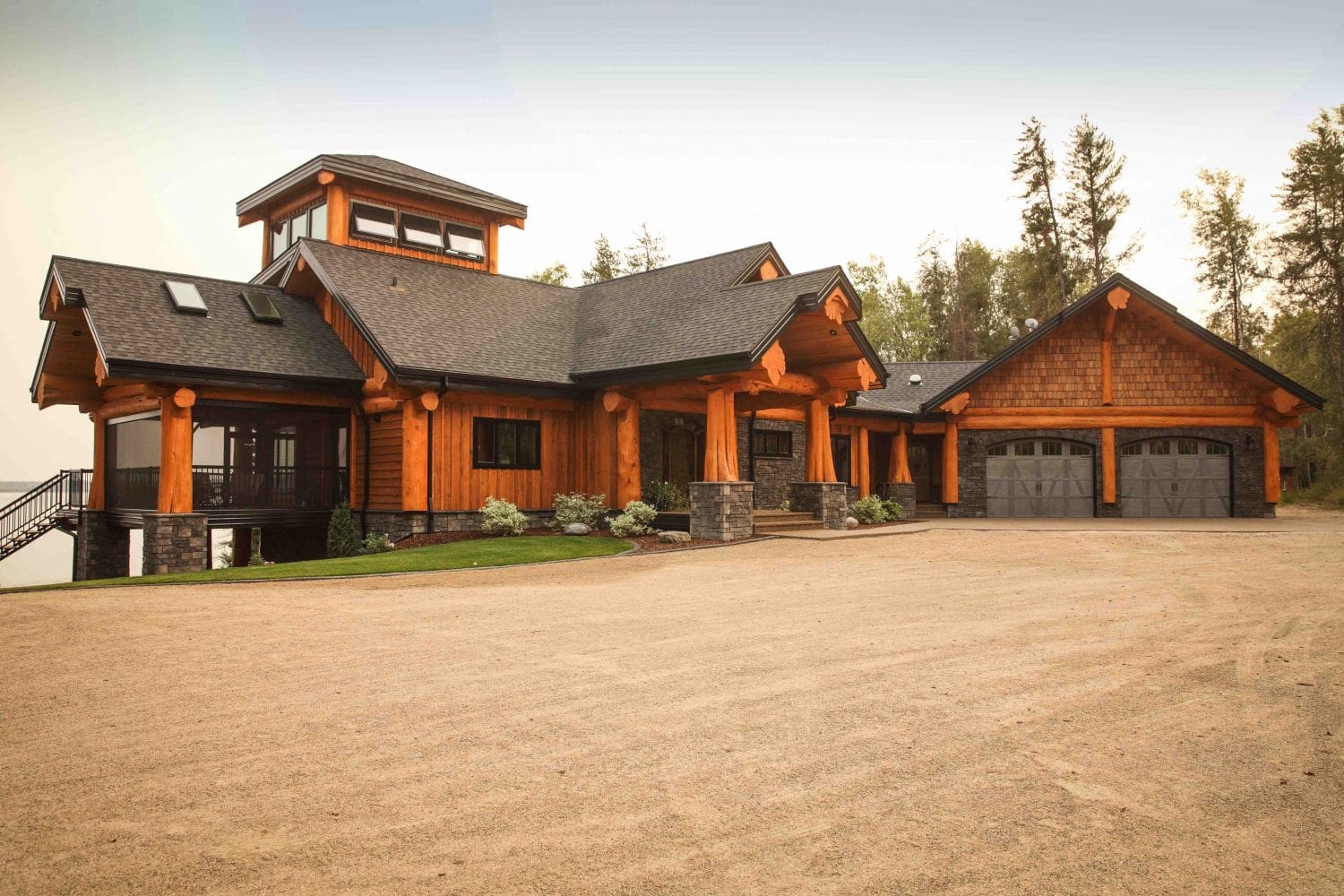 driveway-and-garage-view-of-log-home