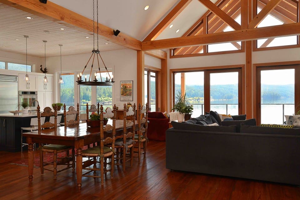 Dining and living room in timber frame home