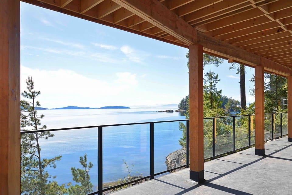 The ocean view from the deck of a modern home
