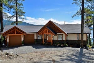 The front of a new timber frame home
