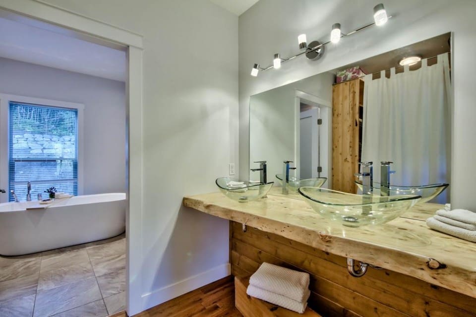 Master bathroom with wood accents