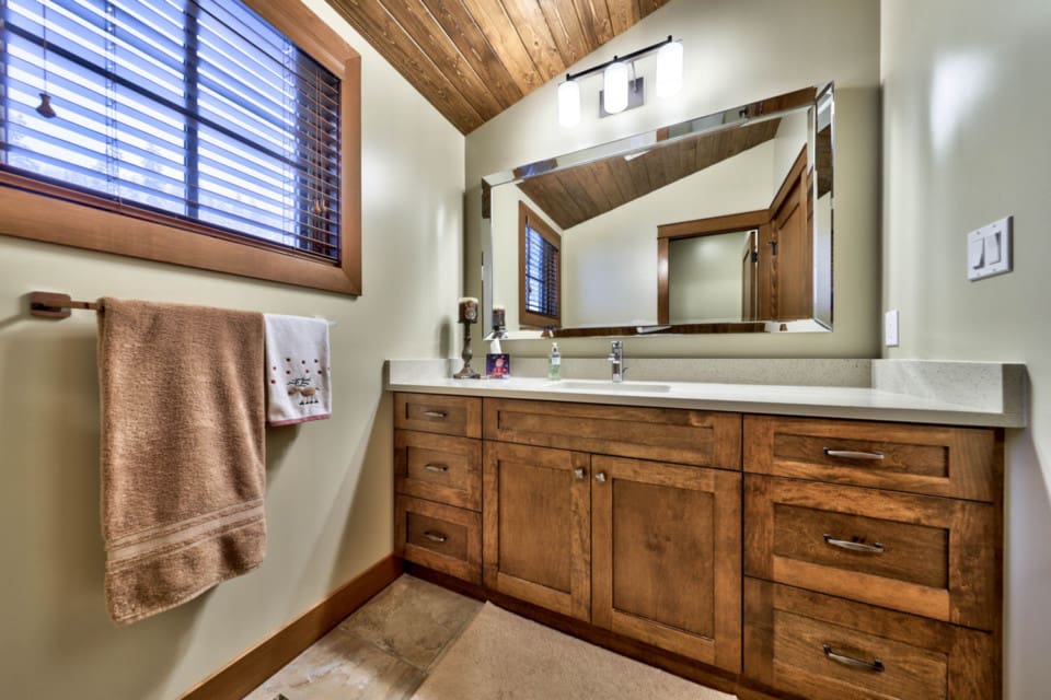 Vanity in the second bathroom of a timber frame log home